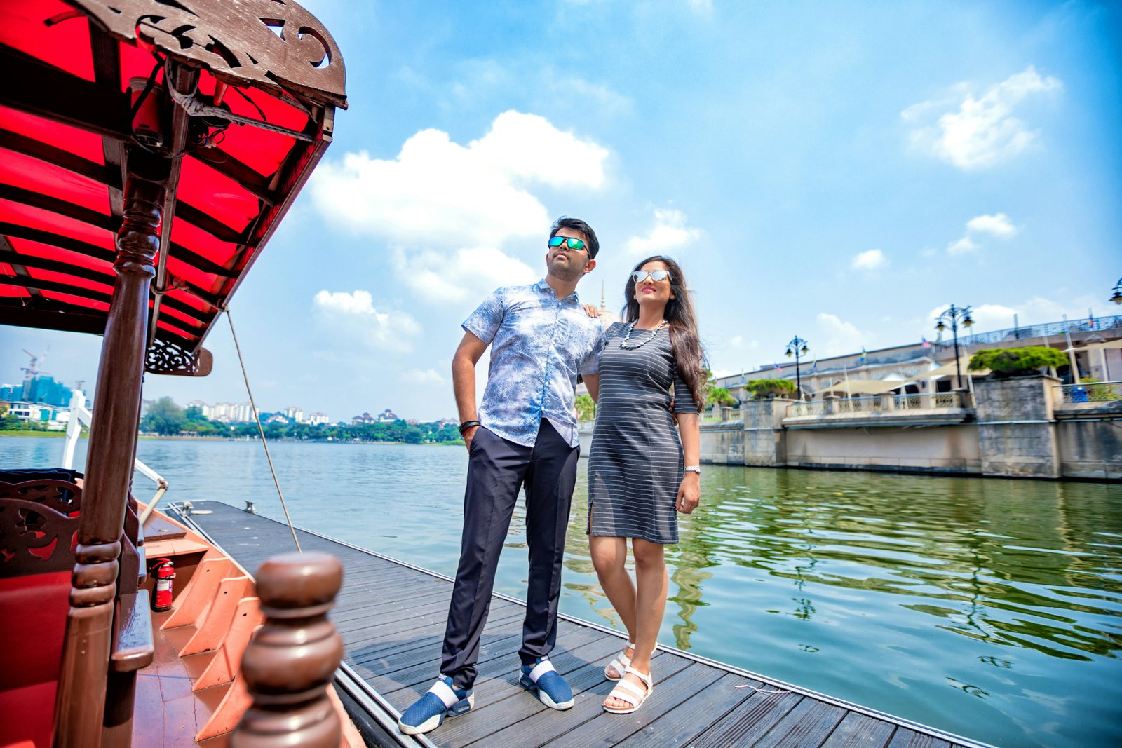 Couple on heritage boat, Kerala waterfront