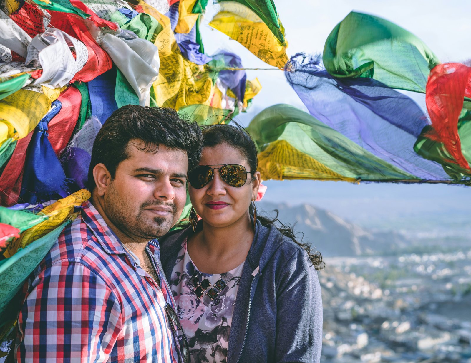 Couple with prayer flags in Dharamshala