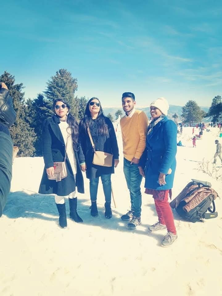 Group in snow at Kufri