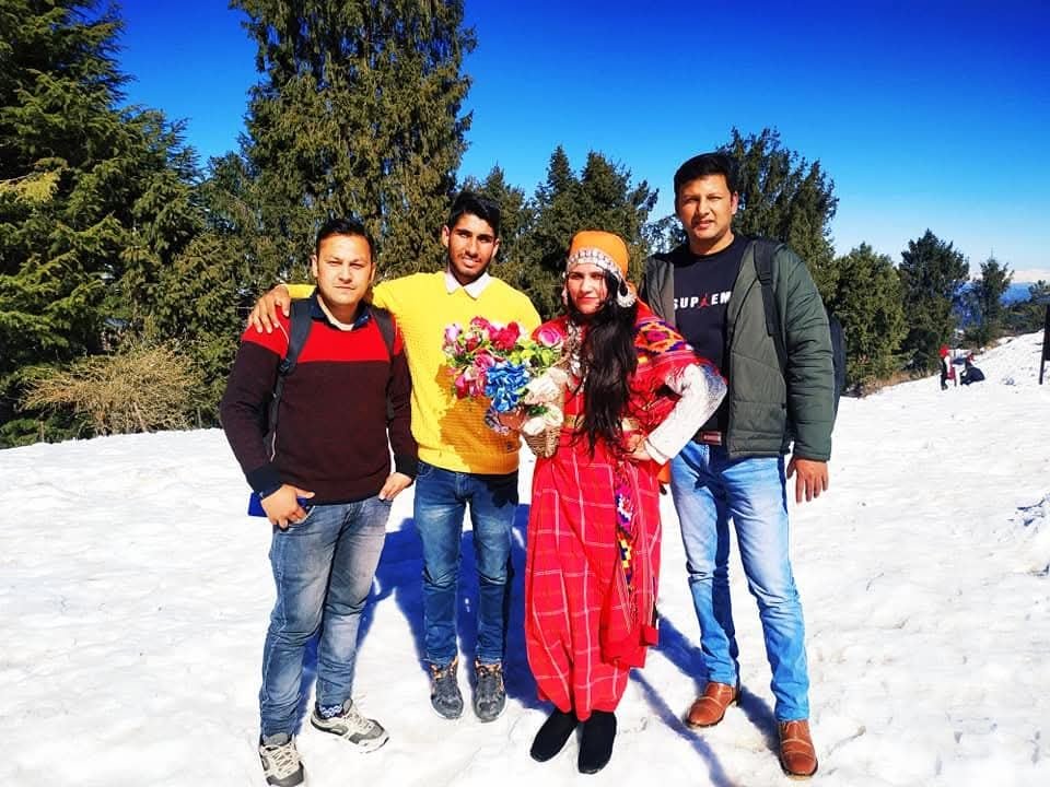 Friends with Himachali local in snow at Kufri